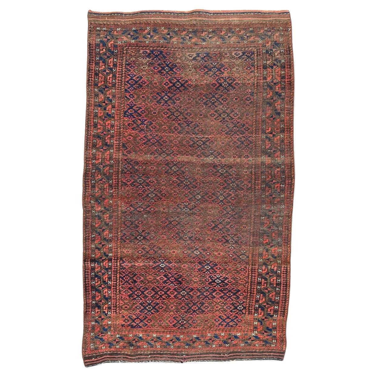 Bobyrug’s pretty antique tribal Turkmen Baluch rug For Sale