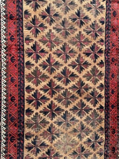 Bobyrug’s pretty antique Turkmen Baluch rug