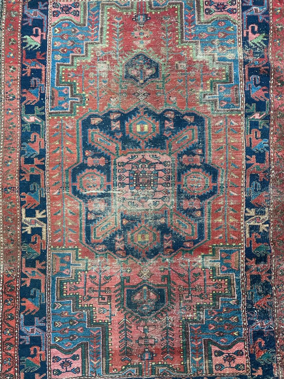 Very pretty late 19th century Hamadan rug with beautiful geometrical and stylized design and nice natural colours with red, blue, green and  pink, entirely hand knotted with wool on cotton foundation. Important wears due to the age and use