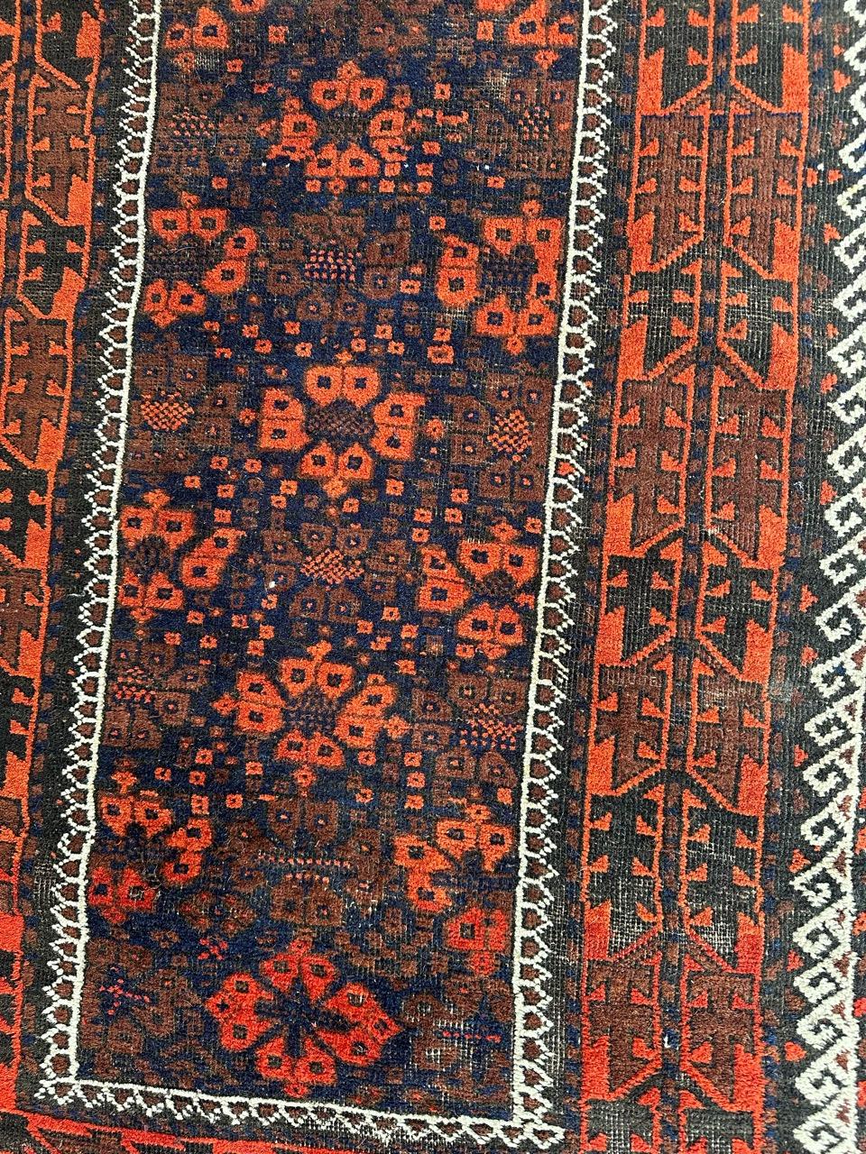 Hand-Knotted Bobyrug’s pretty distressed antique Turkmen Baluch rug  For Sale