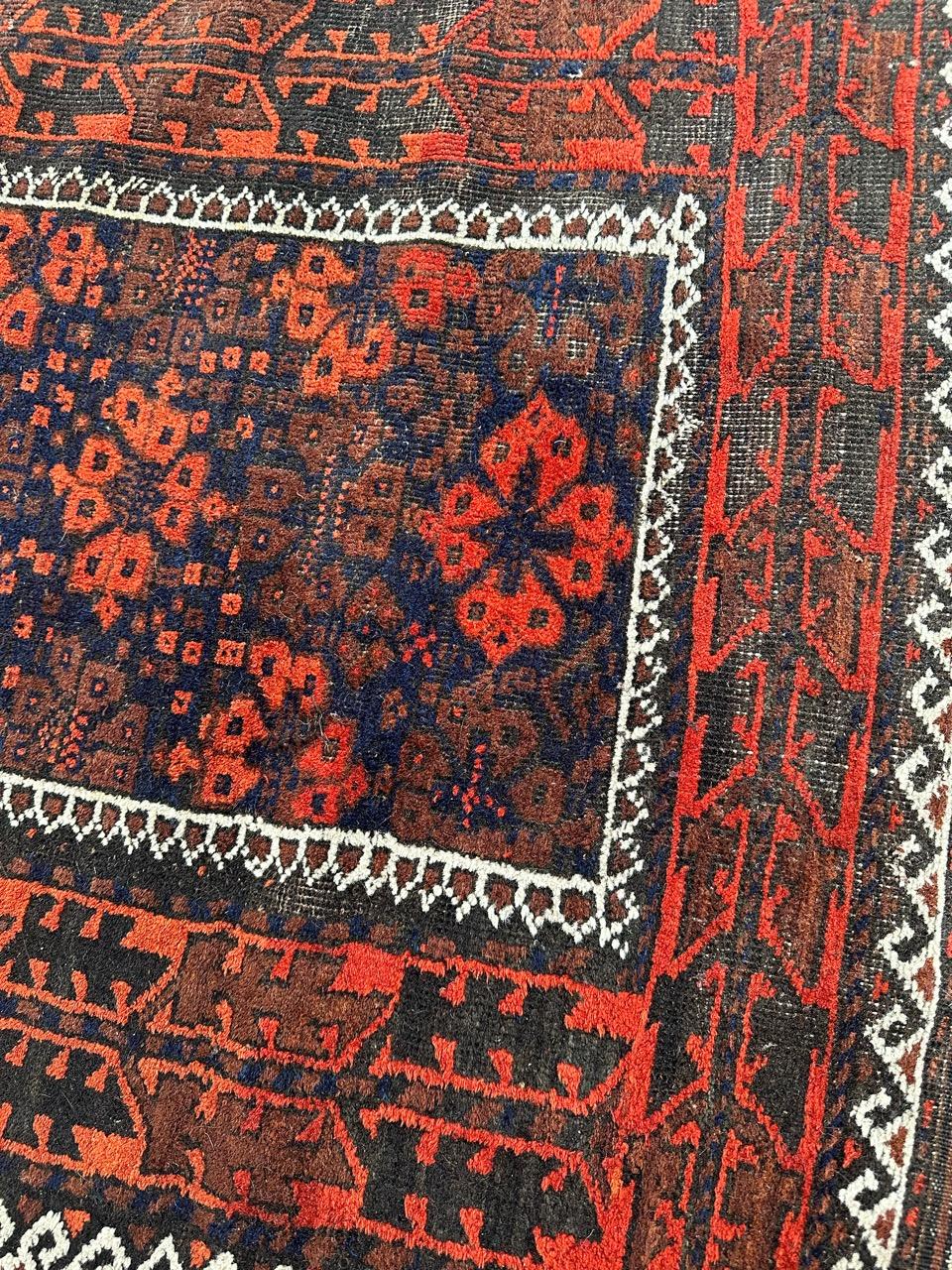 Wool Bobyrug’s pretty distressed antique Turkmen Baluch rug  For Sale