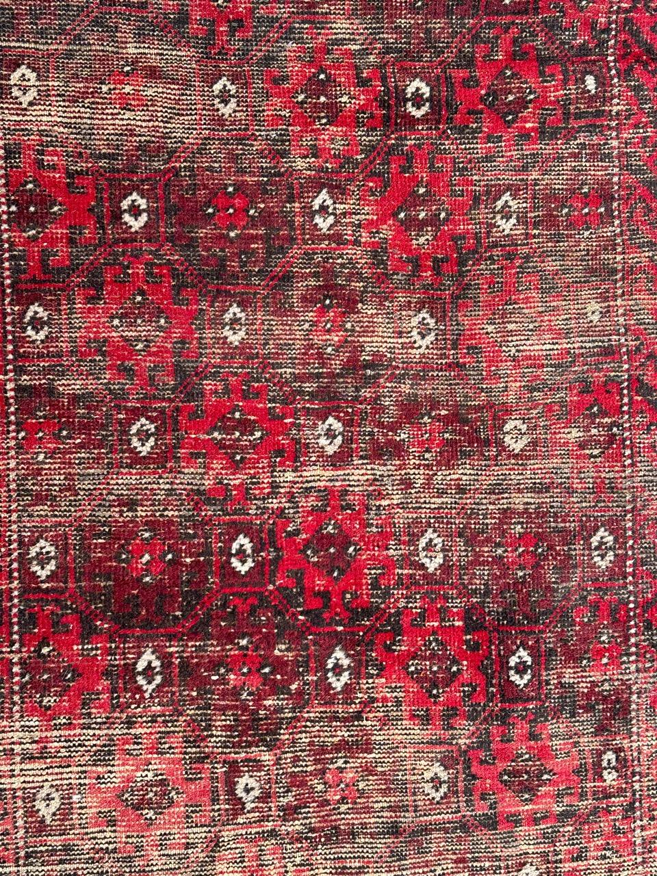 Rustic Bobyrug’s pretty distressed vintage Baluch Afghan rug  For Sale