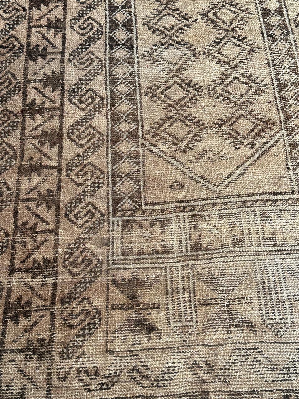 Wool Bobyrug’s pretty faded mid century Baluch rug  For Sale