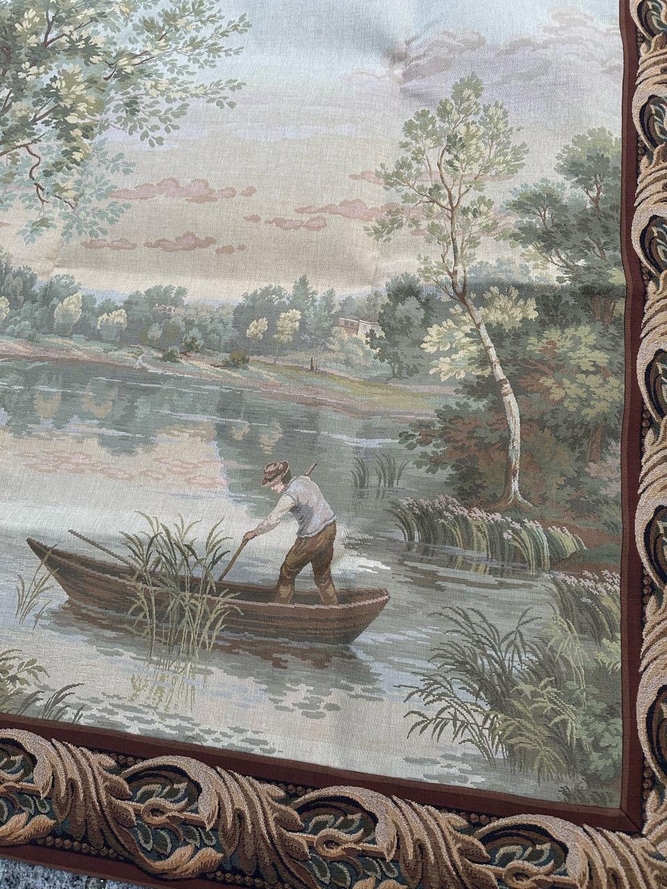 Discover the elegance of this exquisite French tapestry featuring a charming lakeside design and beautiful colors. Crafted on Jacquard looms at Jules Pansu manufacturing using fine cotton, the artwork is inspired by Camille Corot, a renowned French