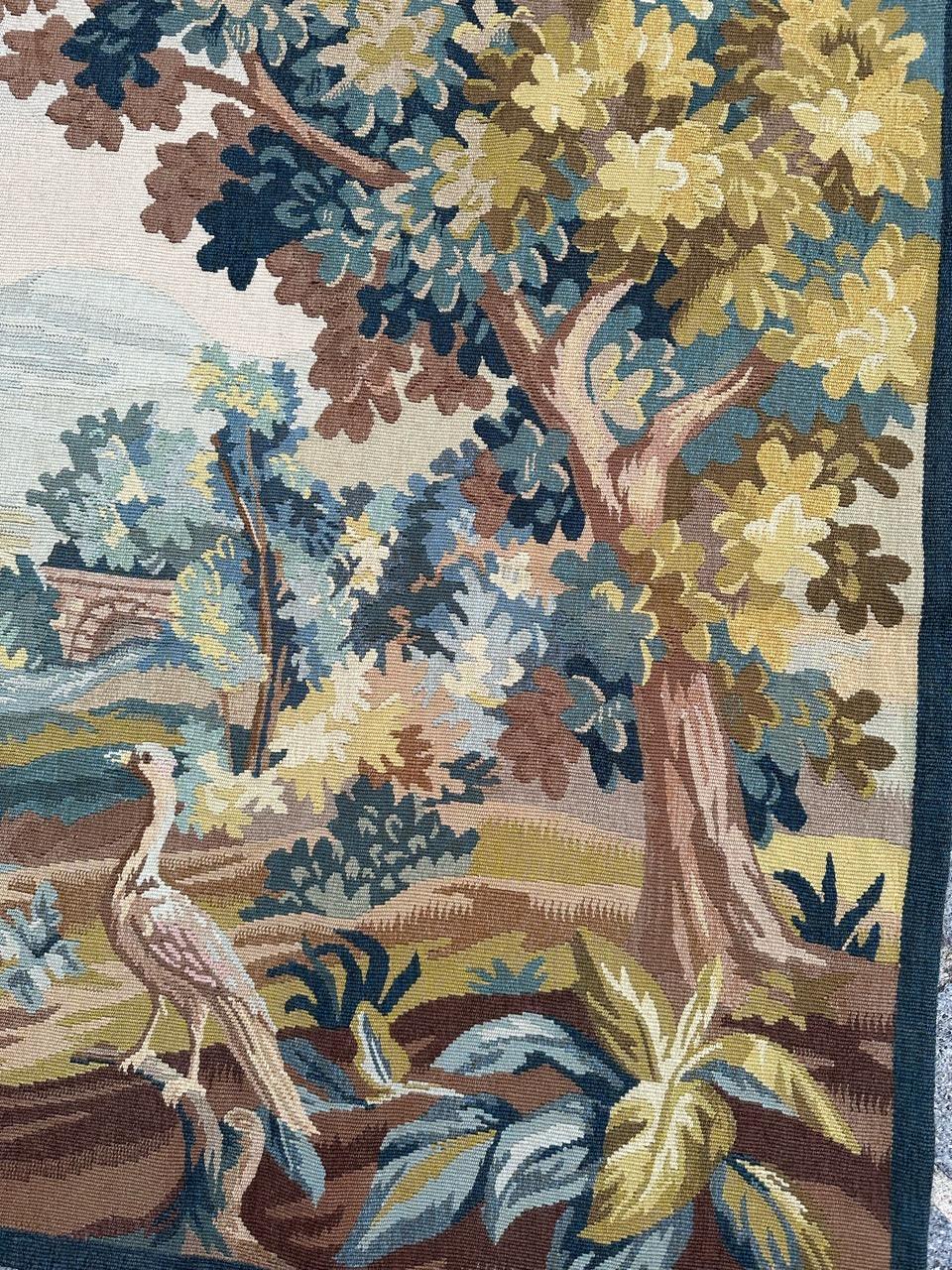 Nice vintage Aubusson tapestry with beautiful design of an 18th century tapestry, with beautiful colours, entirely hand woven with wool and silk on cotton foundation in Robert Four manufacture in Aubusson city in France. 