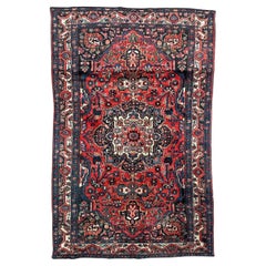 Vintage Bobyrug’s pretty mid century Kurdish rug 
