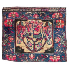 Bobyrug’s pretty mid century tribal Afshar bag face rug 