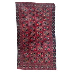 Vintage pretty mid century Turkmen Baluch rug 