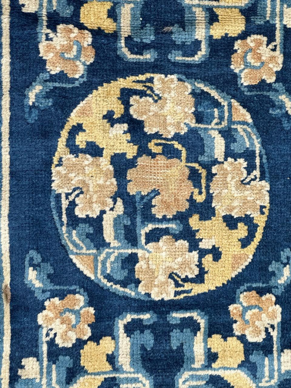 Very nice antique and rare Chinese rug from Ningxia with nice Chinese design and symbols on design, and nice natural colours with a navy blue field and yellow, gold, orange , white and sky blue on design, a beautiful border with stylized designs
