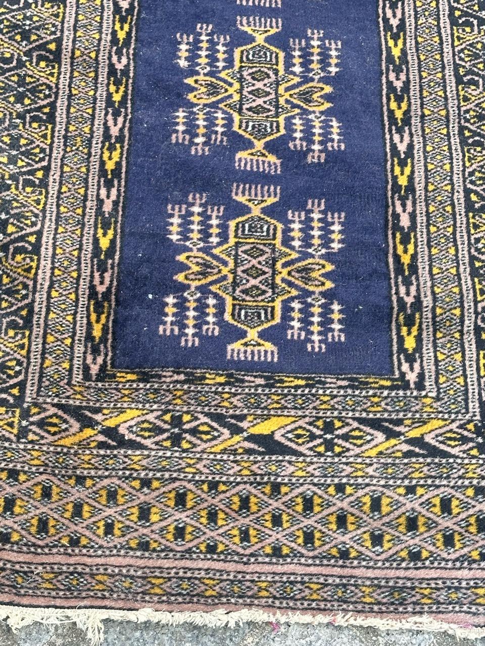 Pretty small vintage Pakistani rug with nice geometrical design in style of Turkmen rugs, and beautiful colours with blue field, pink, yellow, white and black, entirely and finely hand knotted with wool on cotton foundation.

✨✨✨
