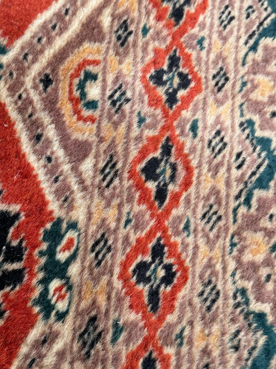 Tribal Bobyrug’s pretty small vintage Pakistani rug For Sale