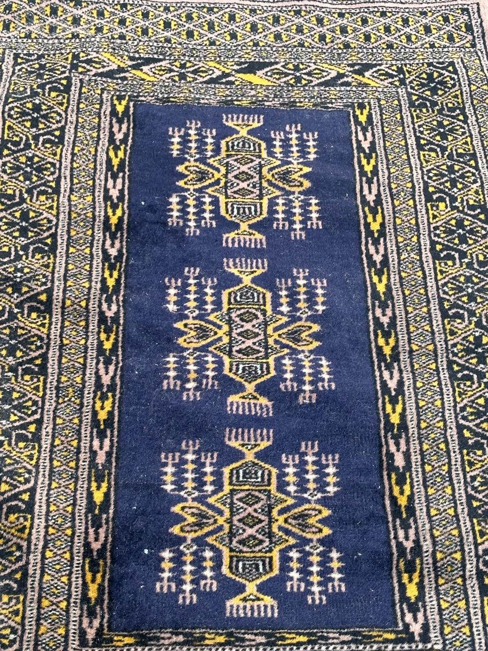 Tribal pretty small vintage Pakistani rug