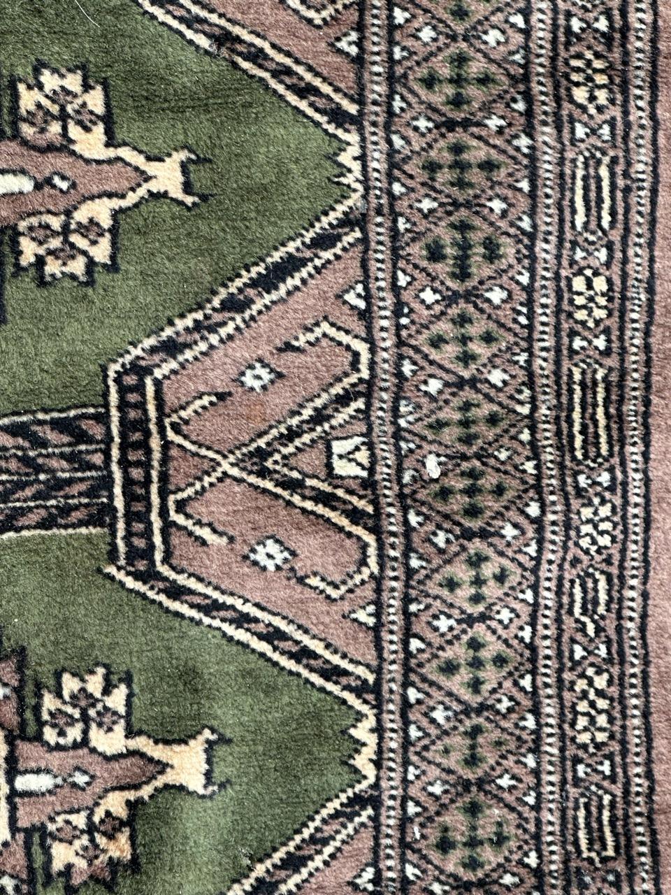 Late 20th Century Bobyrug’s pretty small vintage Pakistani rug For Sale