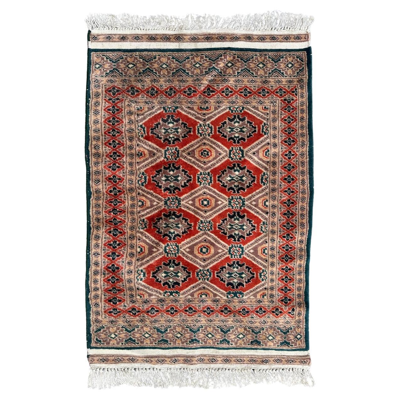 Bobyrug’s pretty small vintage Pakistani rug For Sale