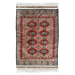 Le joli petit tapis pakistanais vintage de Bobyrug