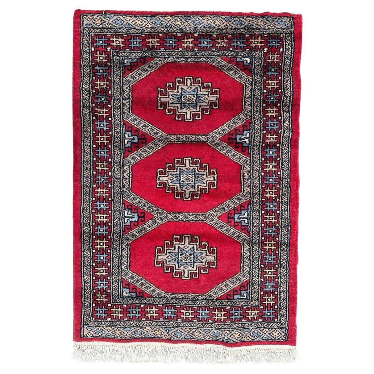  Kleiner, hübscher Pakistanischer Vintage-Teppich