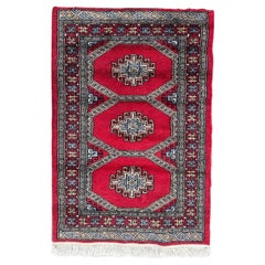  Kleiner, hübscher Pakistanischer Vintage-Teppich