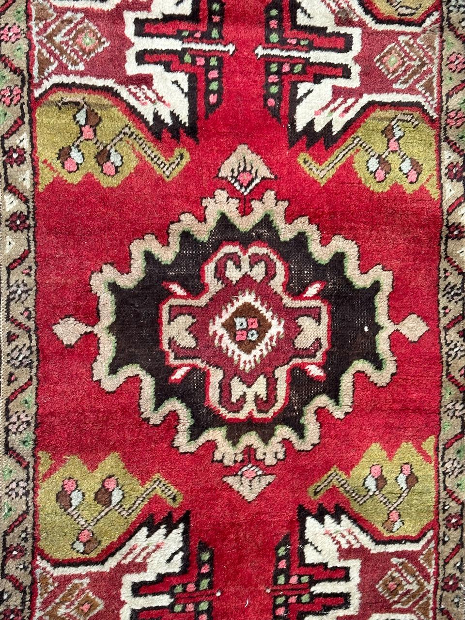 Nice mid century small Turkish rug with beautiful geometrical design and nice colours with red, green, pink, brown, entirely hand knotted with wool on cotton foundation 

✨✨✨
