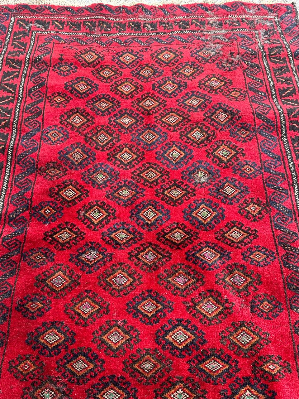 Wool Bobyrug’s Pretty vintage distressed Baluch rug  For Sale