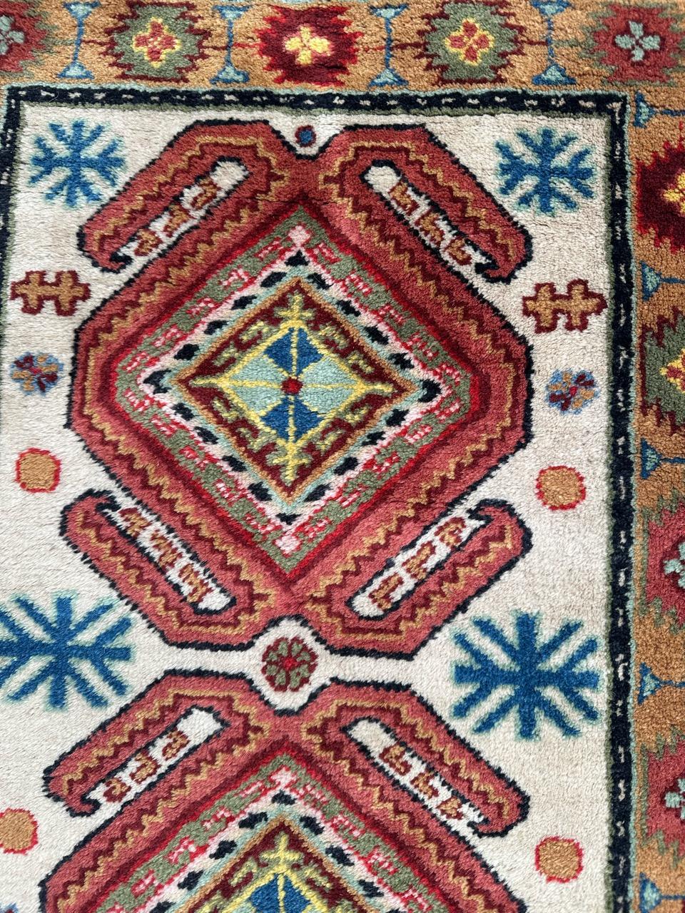 Chinese Bobyrug’s pretty vintage little Caucasian design Sinkiang rug For Sale