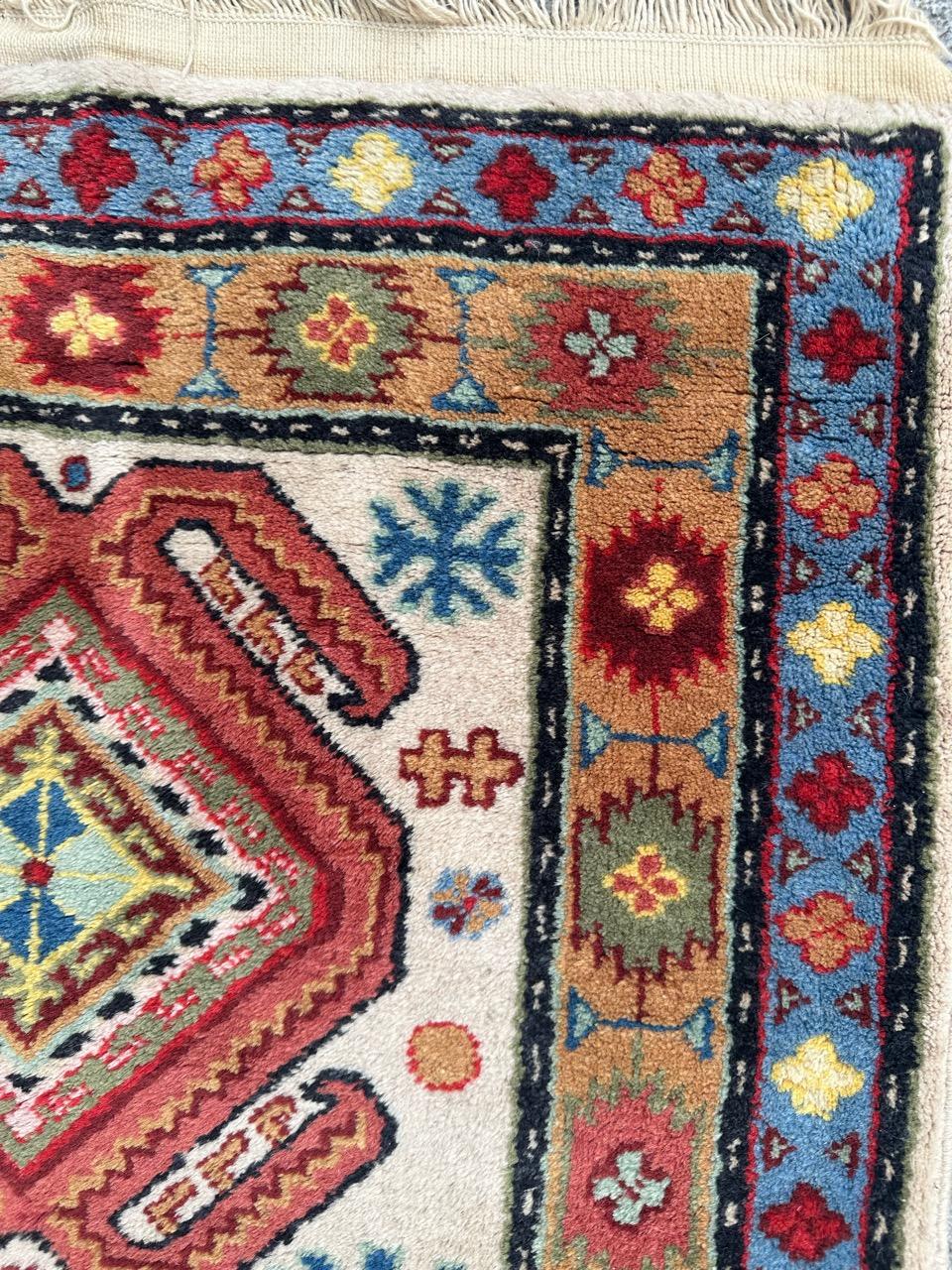 Hand-Knotted Bobyrug’s pretty vintage little Caucasian design Sinkiang rug For Sale
