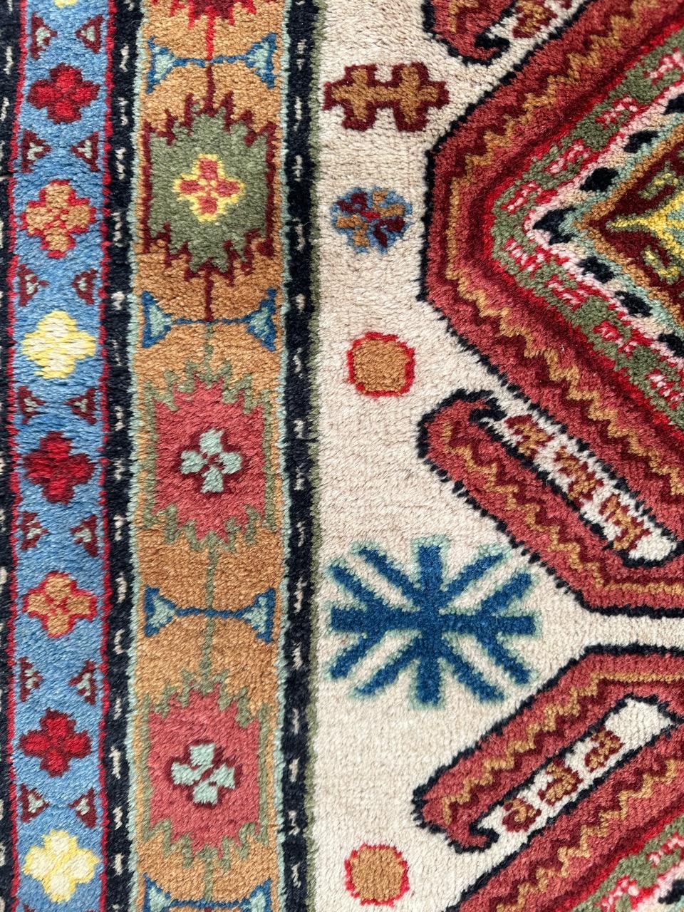 Wool Bobyrug’s pretty vintage little Caucasian design Sinkiang rug For Sale
