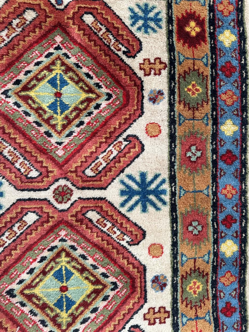 Bobyrug’s pretty vintage little Caucasian design Sinkiang rug For Sale 1