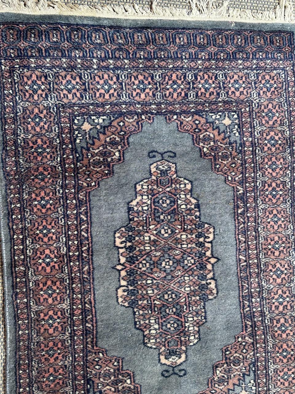 Tribal Bobyrug’s pretty vintage small Pakistani rug  For Sale