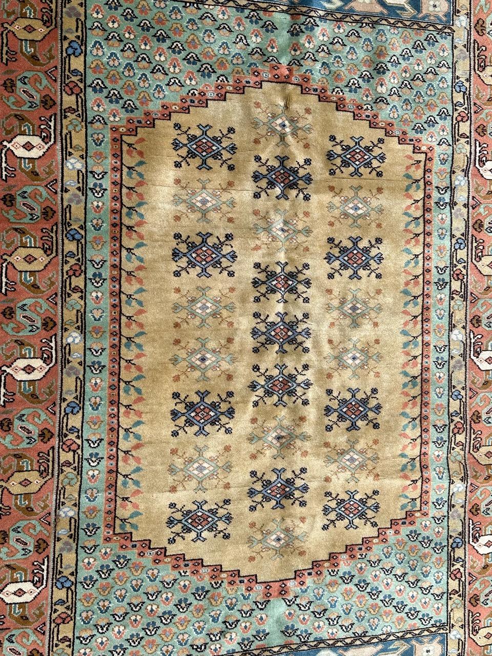 Nice vintage Turkish rug with beautiful geometrical design and nice colours with yellow, green, orange, blue and grey. Entirely hand knotted with wool on cotton foundation 

✨✨✨

