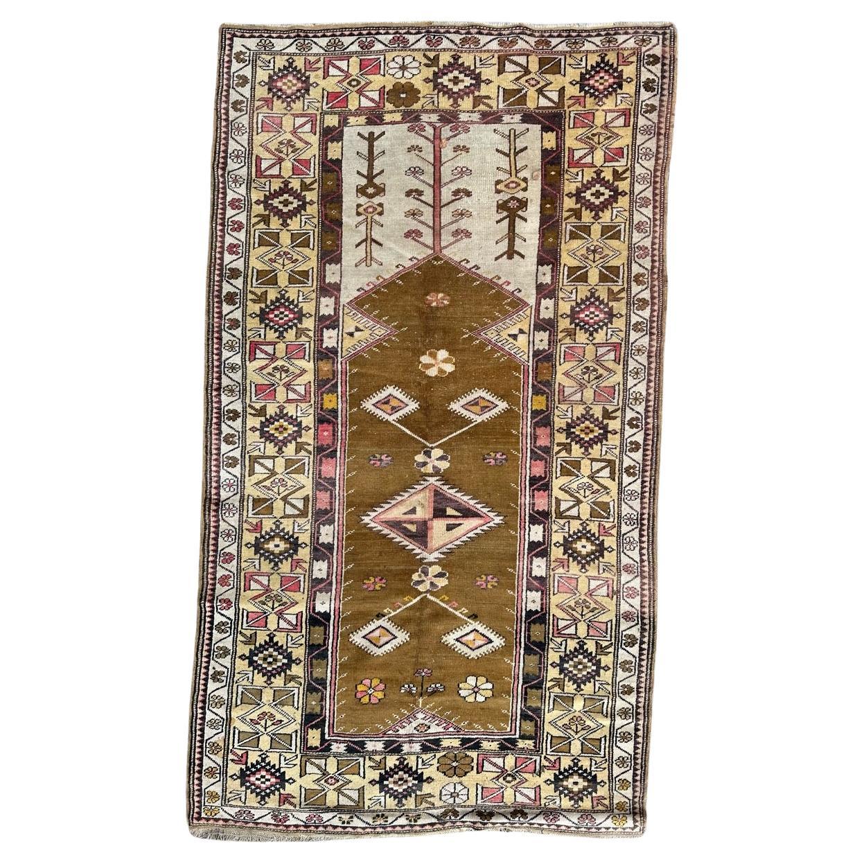 Bobyrug’s pretty vintage Turkish Anatolian rug For Sale