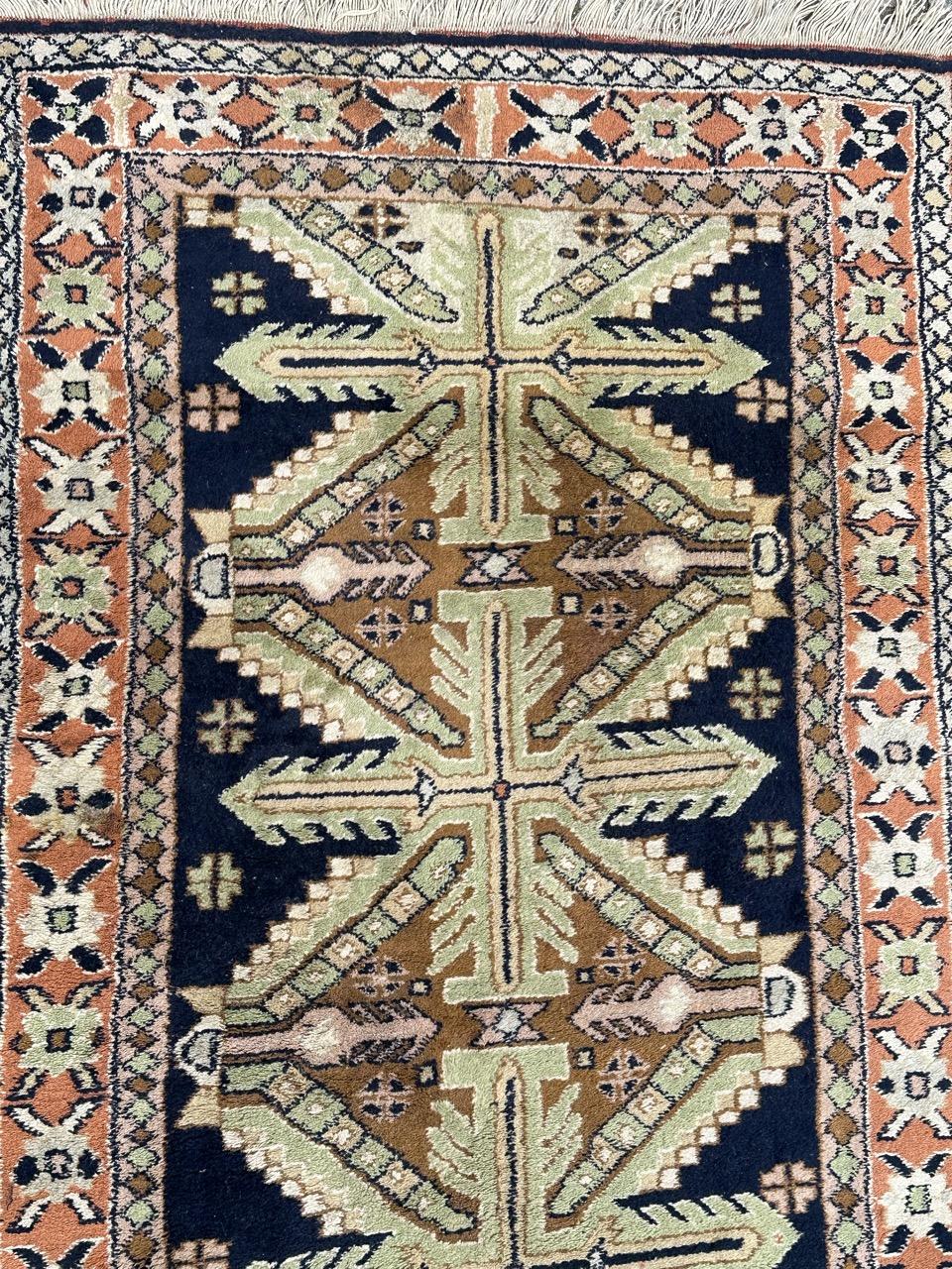 Oushak Bobyrug’s pretty vintage Turkish rug  For Sale