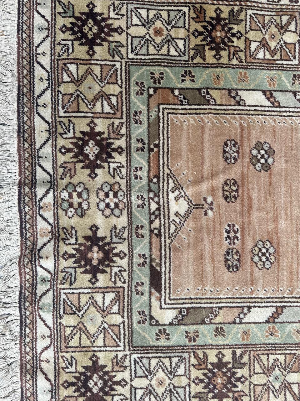 Oushak Bobyrug’s pretty vintage Turkish style rug For Sale
