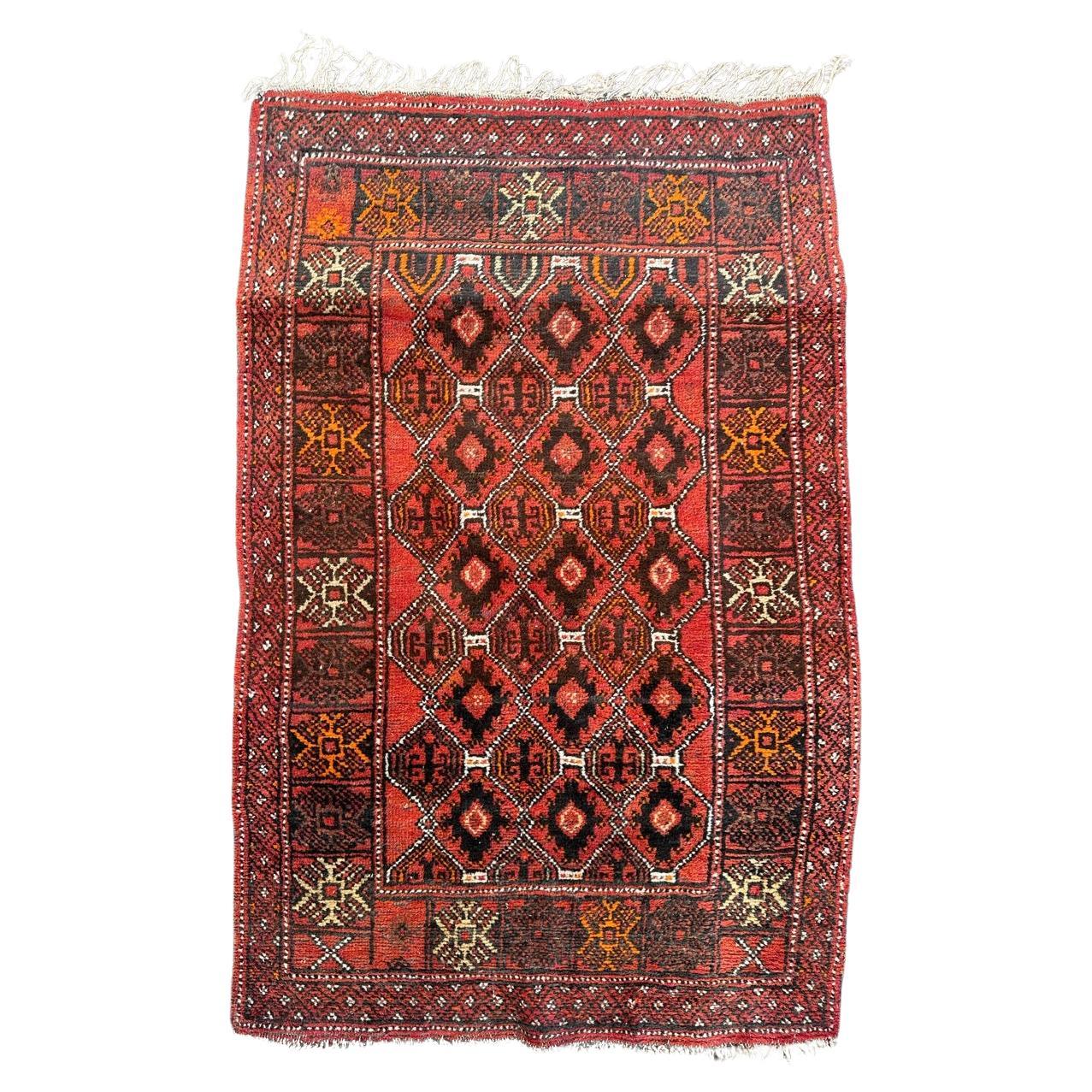 Bobyrug’s pretty vintage Turkmen Baluch rug For Sale