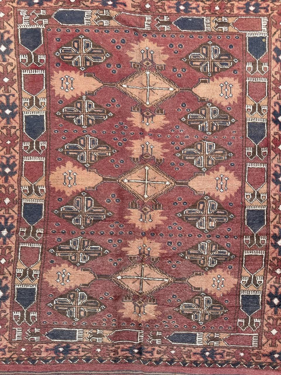 Pretty late 20th century Turkmen Afghan rug with beautiful decorative design and nice colours with a red brown field, orange and grey, entirely and finely hand knotted by wool on wool foundation with a soft texture.

✨✨✨
