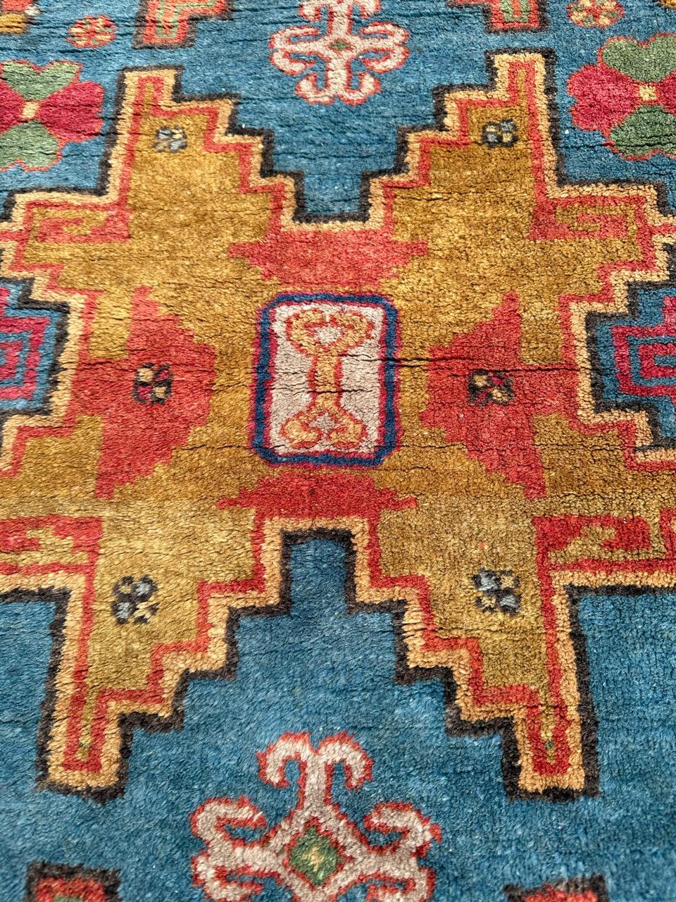 Chinese Bobyrug’s pretty vintage Xinjiang shirvan design rug 