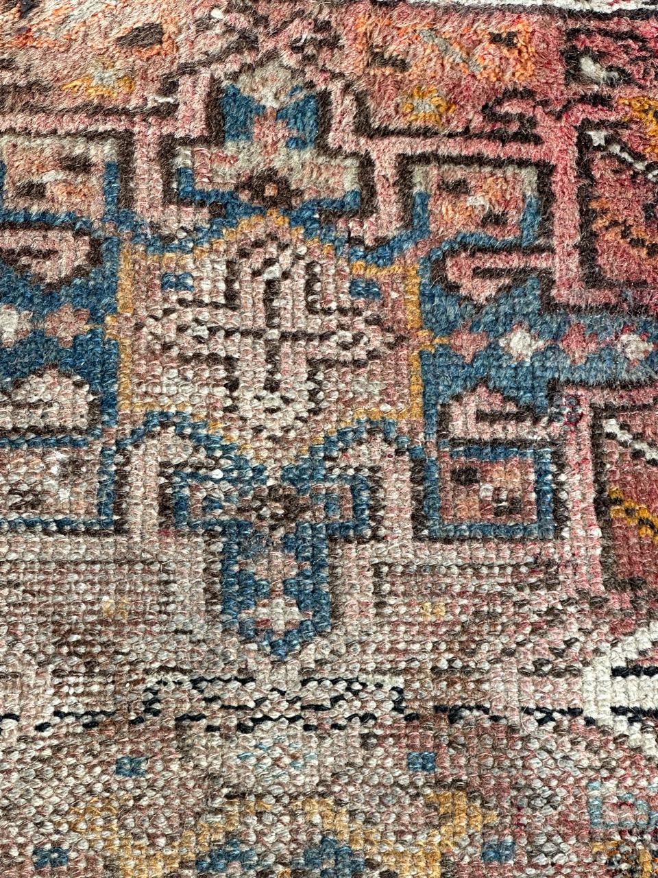 Heriz Serapi Bobyrug’s small mid century faded distressed Heriz rug  For Sale