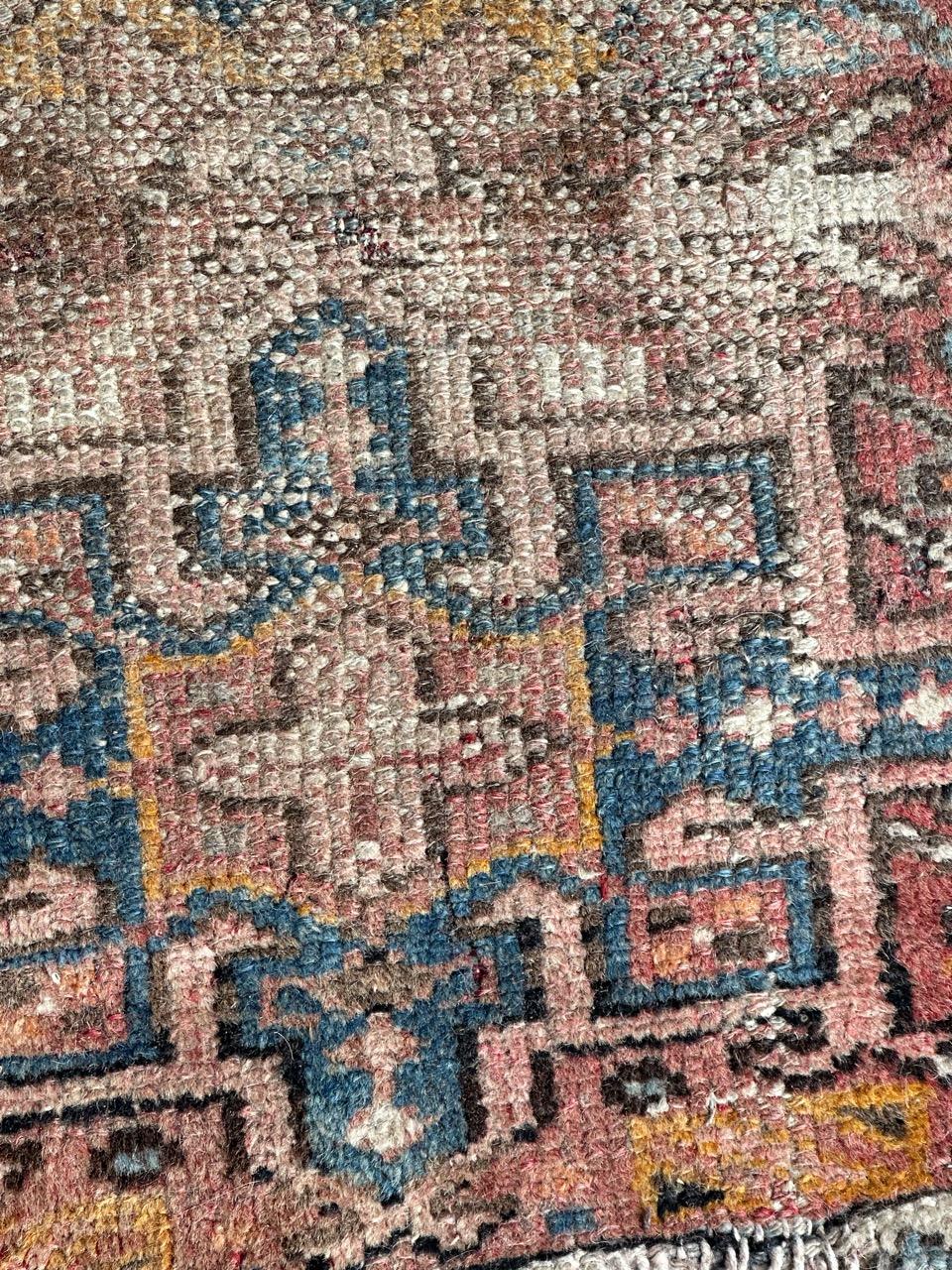 Asian small mid century faded distressed Heriz rug  For Sale