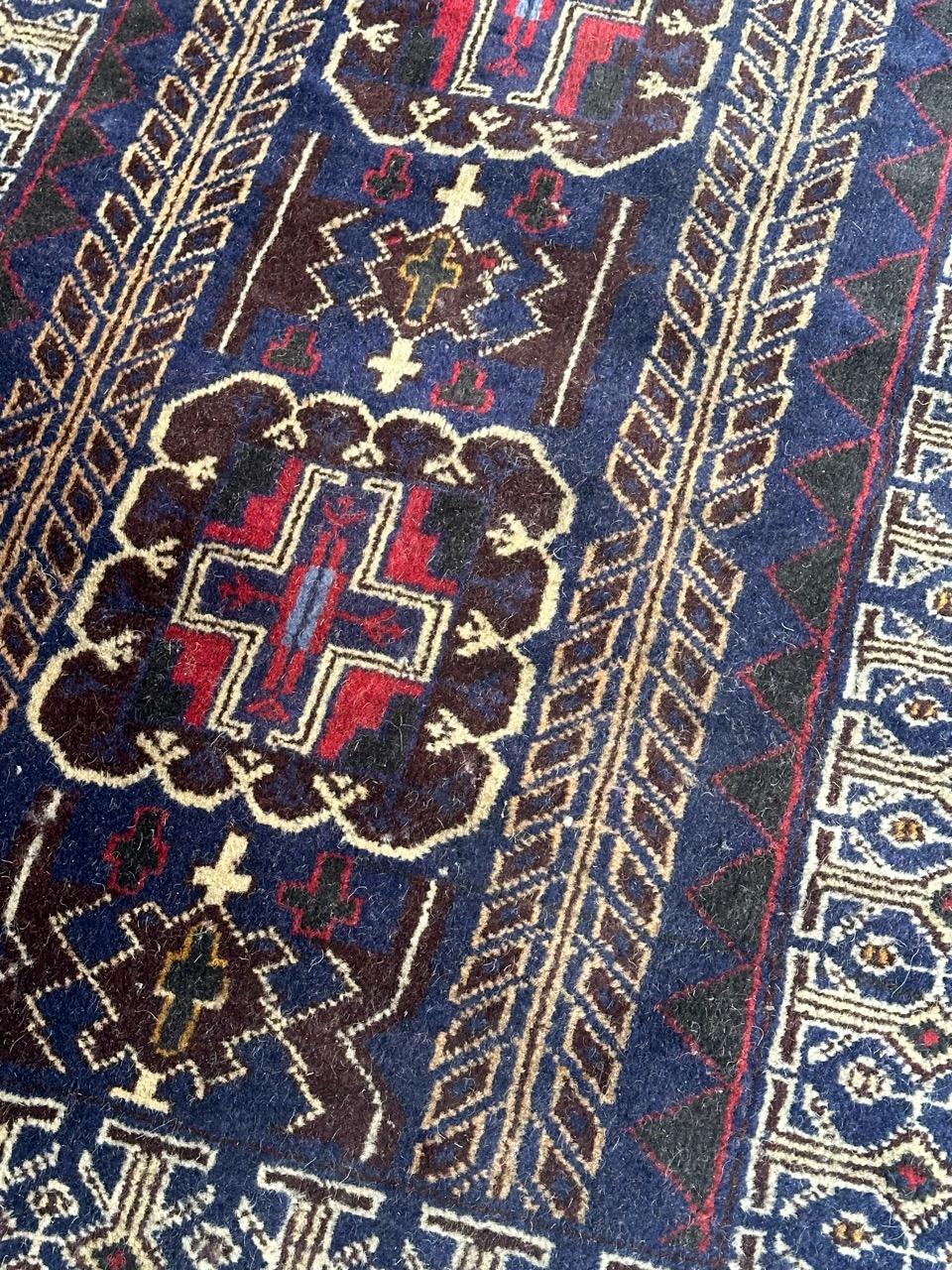 Nice vintage Turkmen Baluch rug with beautiful tribal and geometrical design and nice colours with blue, pink, purple, yellow and white. Some wears due to use, entirely hand knotted with wool on wool foundation 

✨✨✨
