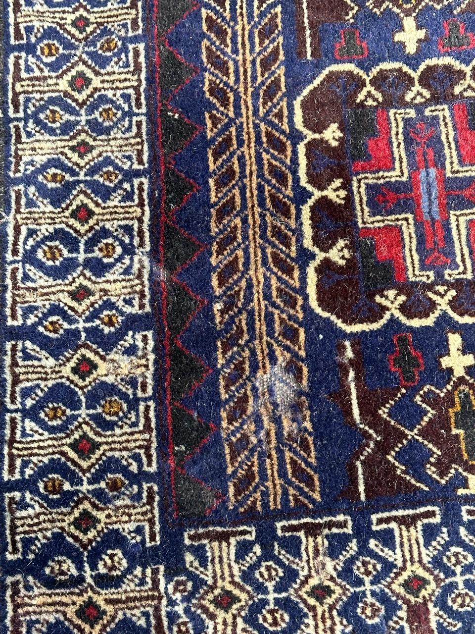 Tribal Bobyrug’s vintage Baluch rug For Sale