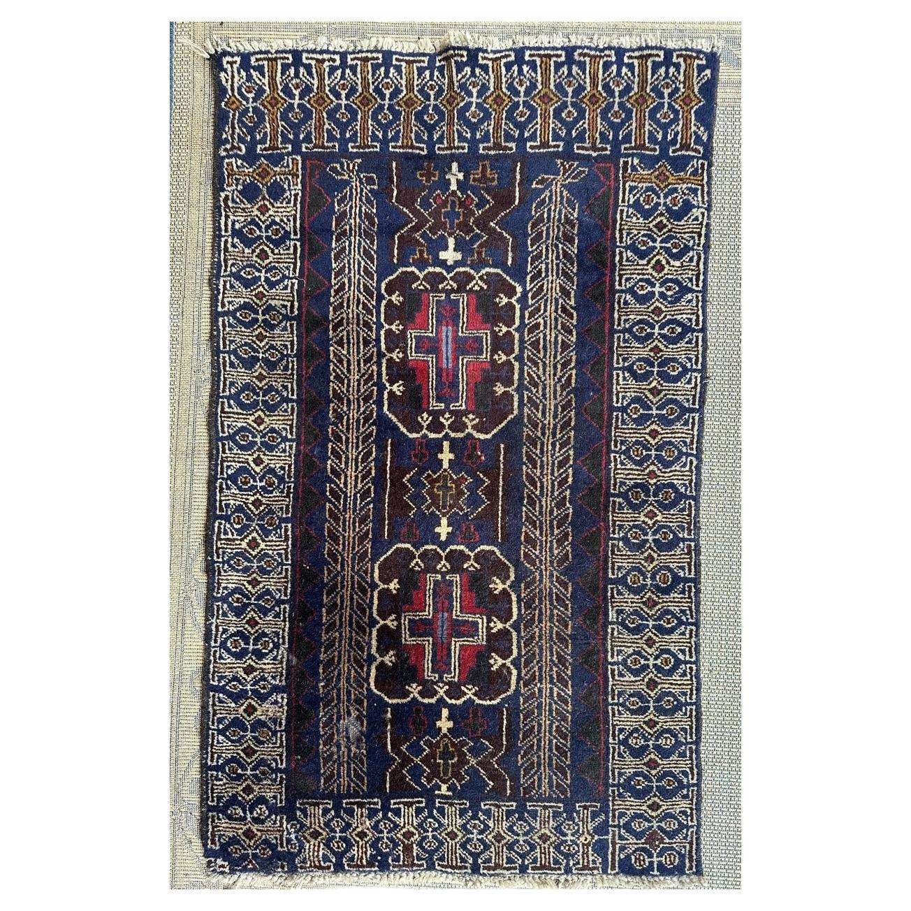 Bobyrug’s vintage Baluch rug For Sale