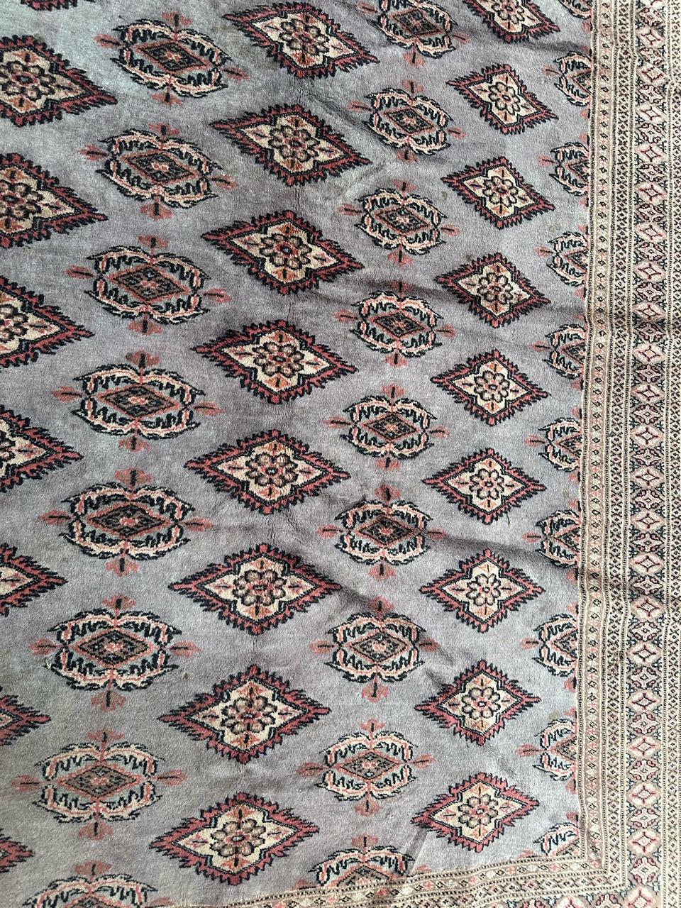 Rustic Bobyrug’s vintage Pakistani rug  For Sale