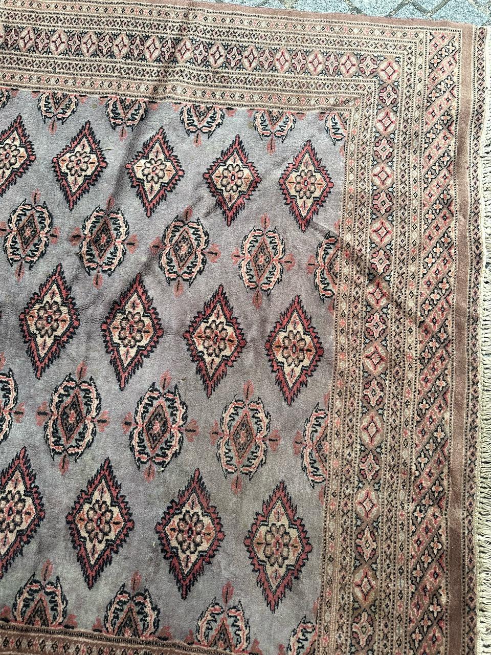 Hand-Knotted vintage Pakistani rug  For Sale