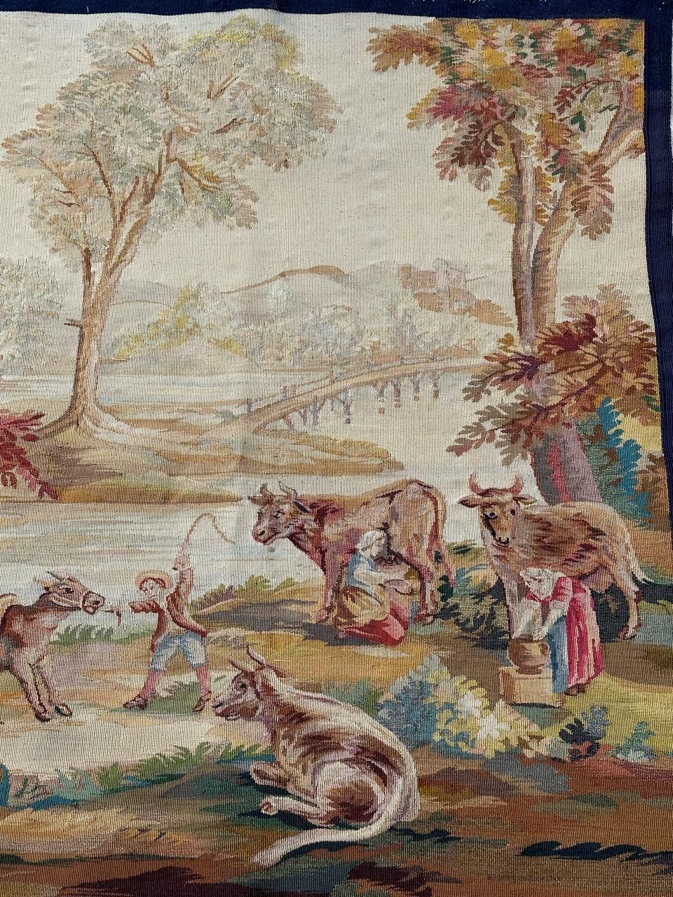 Very beautiful and fine Aubusson tapestry with a nice design featuring country women milking cows, and a child playing with a pony, by the river, and with beautiful colours, entirely and finely handwoven with wool and silk, at Aubusson