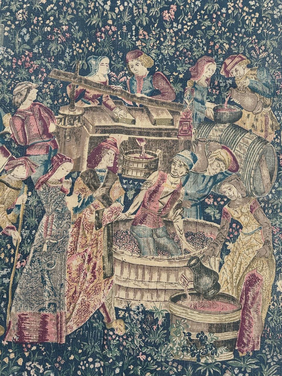 Discover the elegance of this mid-century French hand-printed tapestry featuring the exquisite design of the left half (the pressing side) of the renowned medieval museum tapestry, 