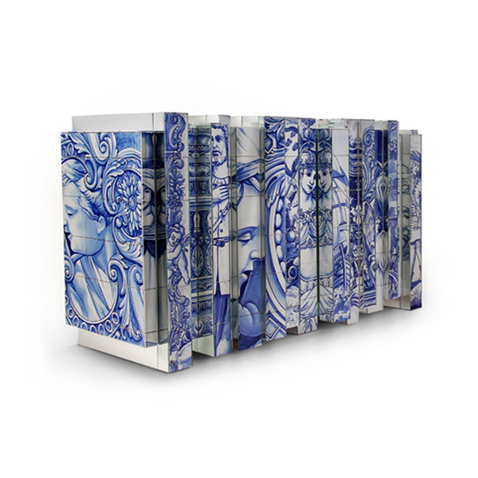 Heritage sideboard by Boca do Lobo. Covered with hand painted blue tiles. Interior composed by one door and four drawers covered with gold leafs. It also has two shelves in bronze and glass. Limited edition product.
