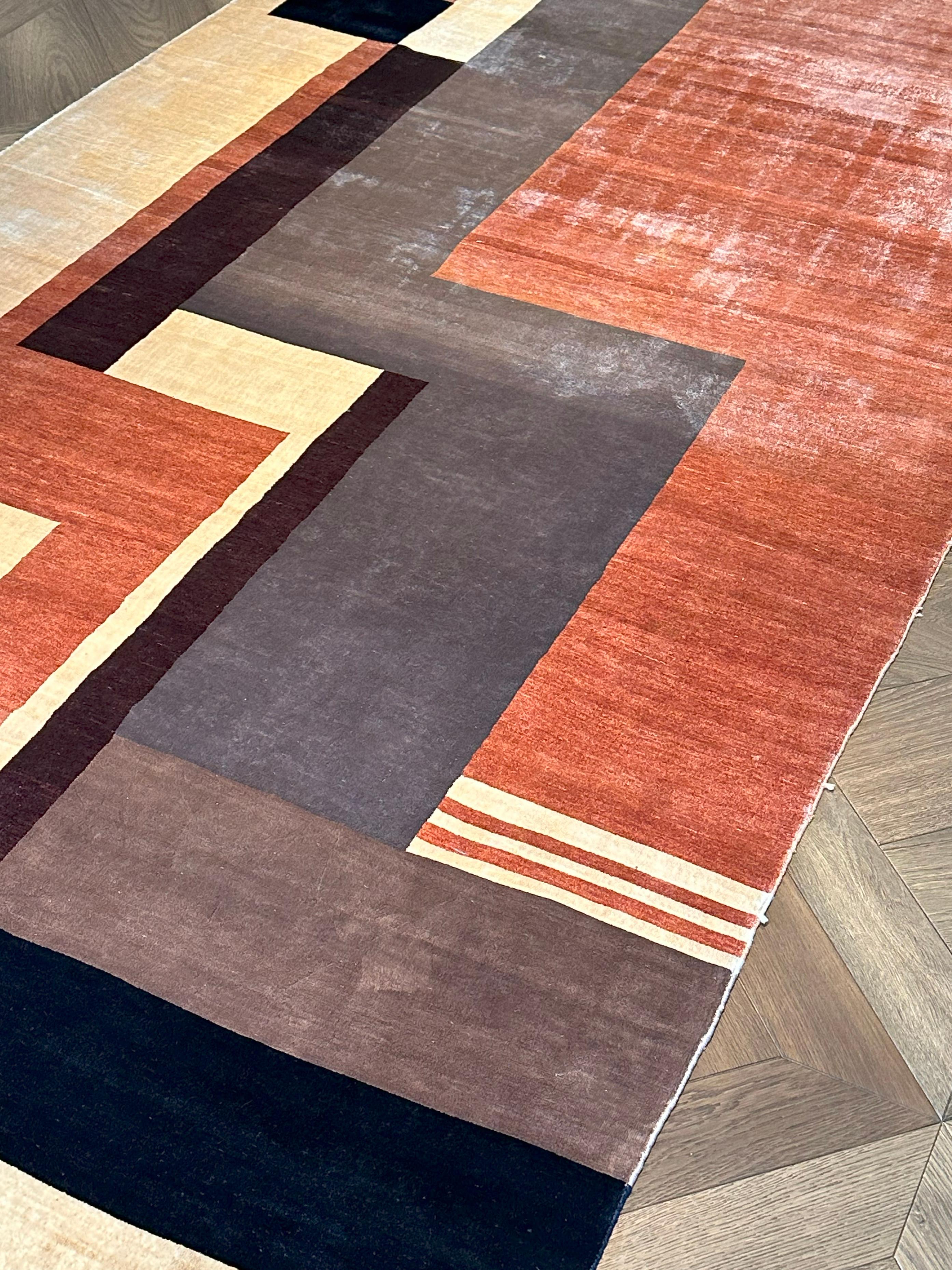 A finely hand knotted silk rug by Boccara, designed in homage to the iconic French Art Deco textile artist Ivan da Silva Bruhns. Commissioned in 2009, the rug features a strong modernist composition of geometric forms, reflecting Bruhns’ distinctive