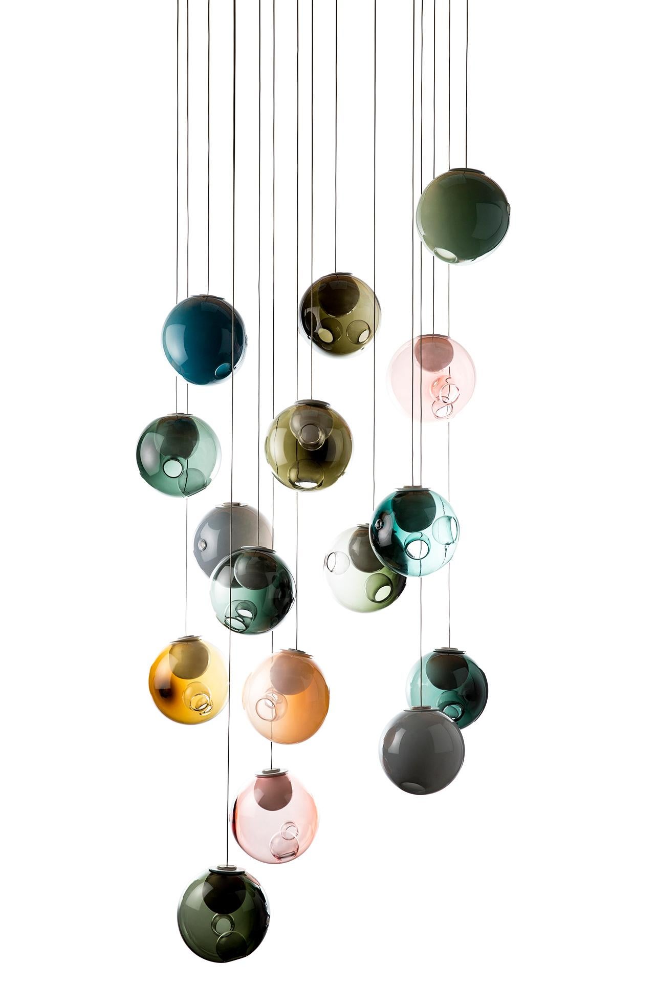 The 28.16 random color is a chandelier composed of 16 mouth blown spheres in color. There are a possible 64 colors to chose from and the spheres can be transparent color, opaque color or you can chose only to have the 