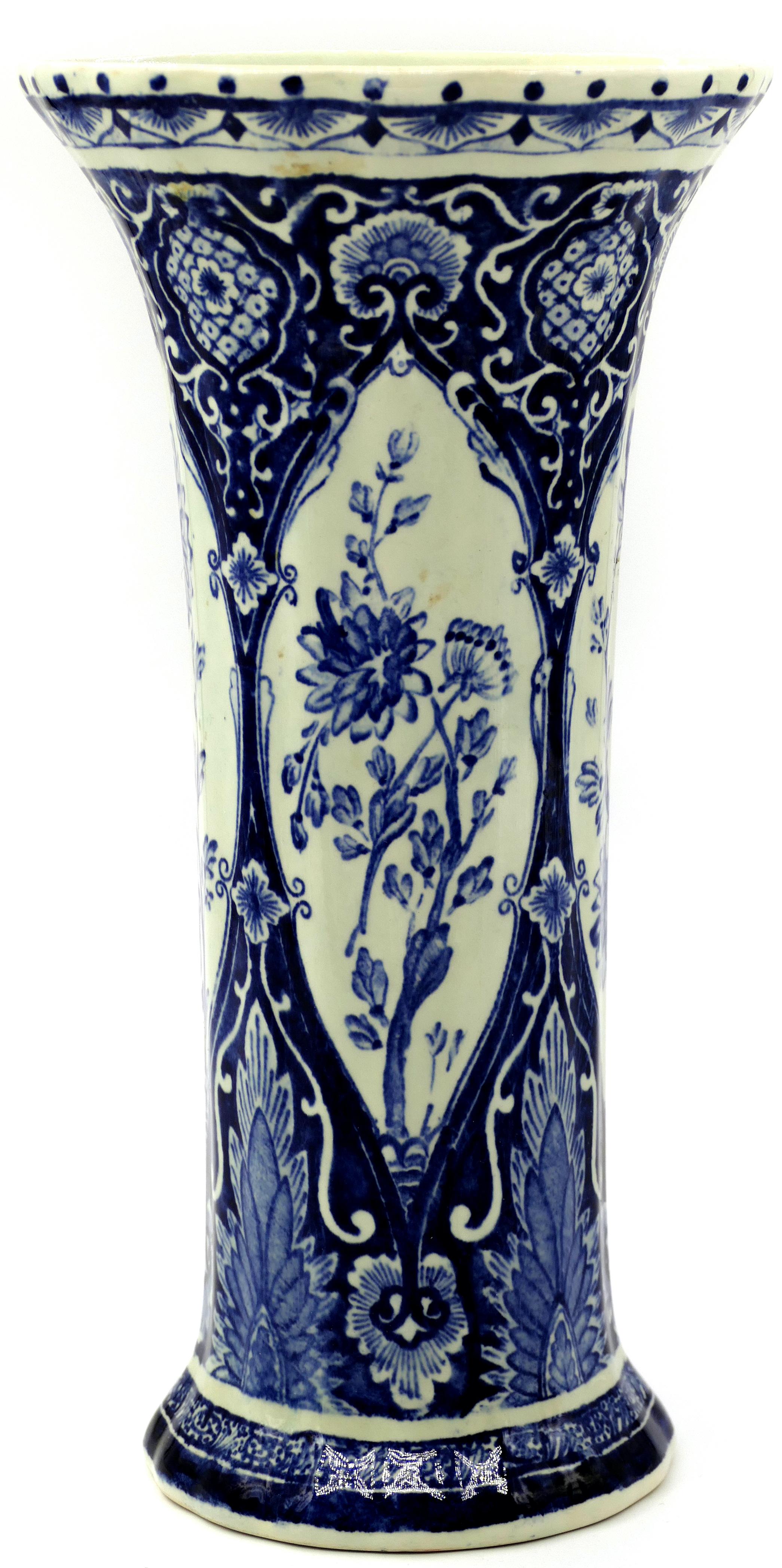 This is a Boch Delft ceramic vase, produced at the beginning of 20th century.

Under the base the inscription 