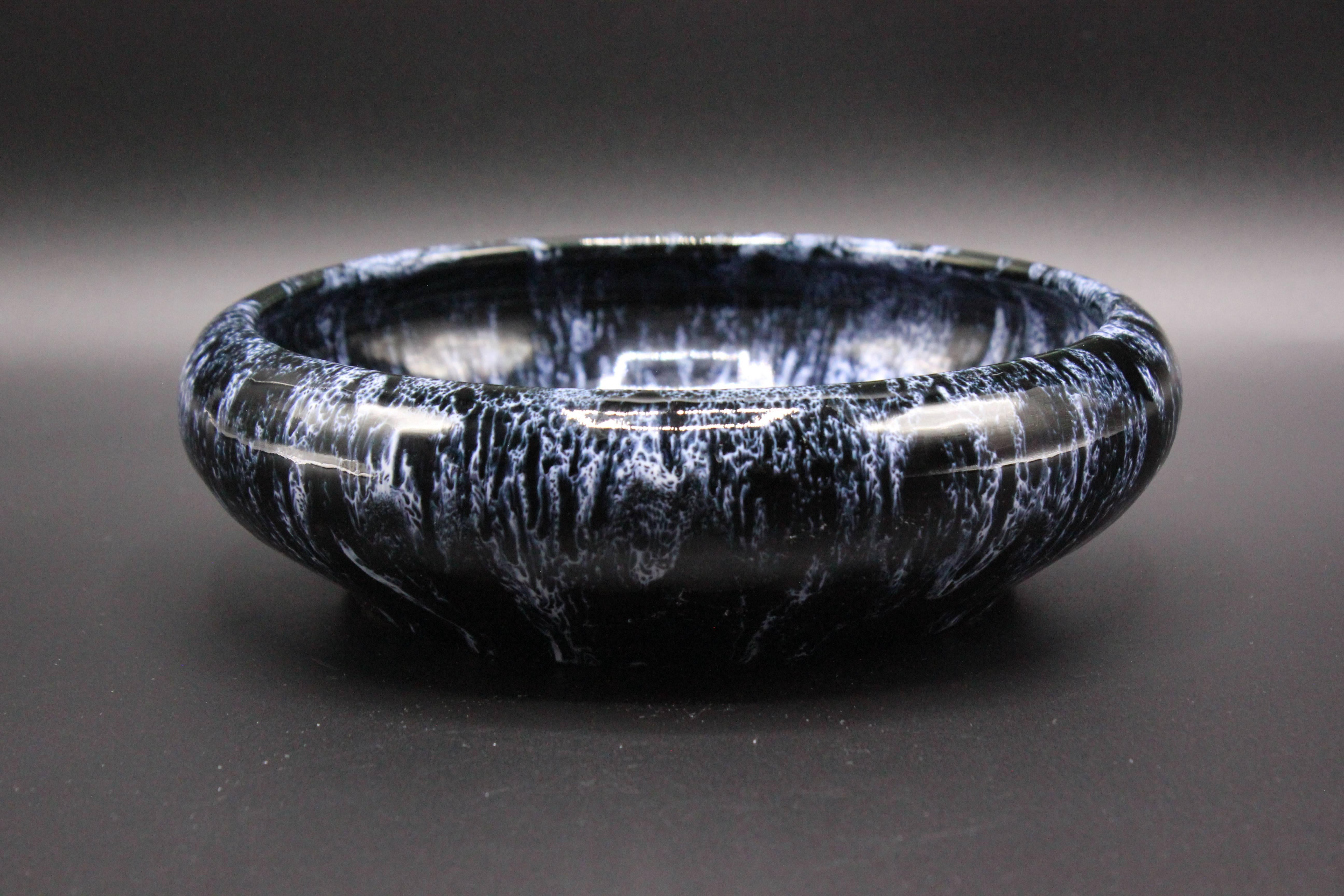 Low Art Deco bowl produced by Boch Freres Keramis in La Louviere, Belgium. Bowl has blue and white drip glaze finish with orange colored center. Printed factory mark with 