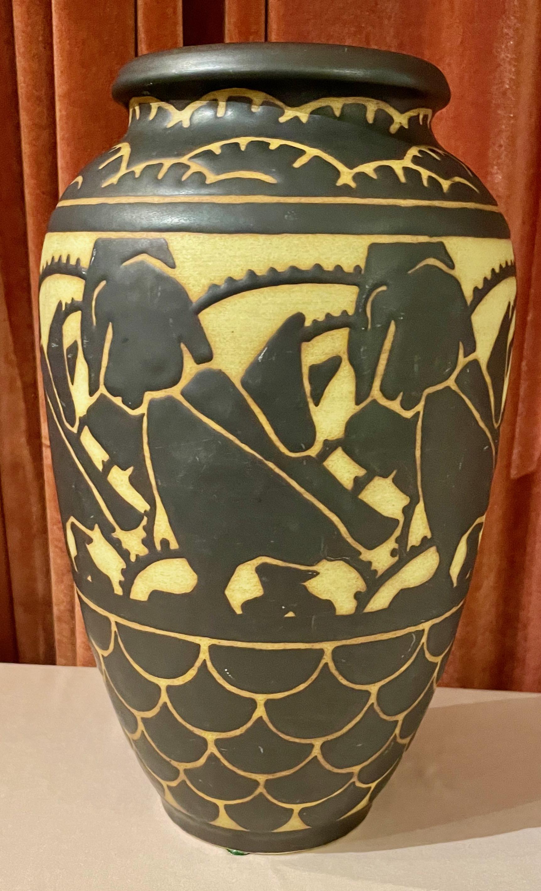Art Deco Gres Keramis stoneware vase designed by Charles Catteau for Boch Freres of Belgium, circa 1925. These animal designs are the most sought after and most collectible of all the Catteau pieces. Stoneware pieces with animal motifs are even more